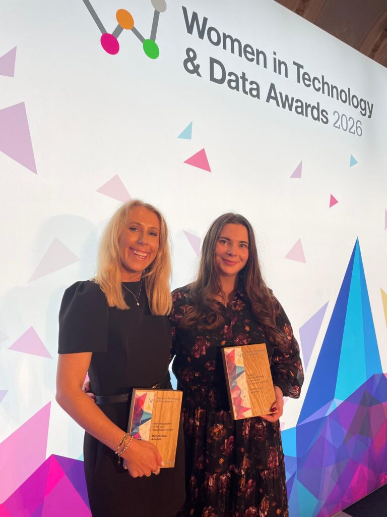 Michelle Earp and Amelia Doyle accept their awards at the Waterstech Women in Technology & Data Awards ceremony.